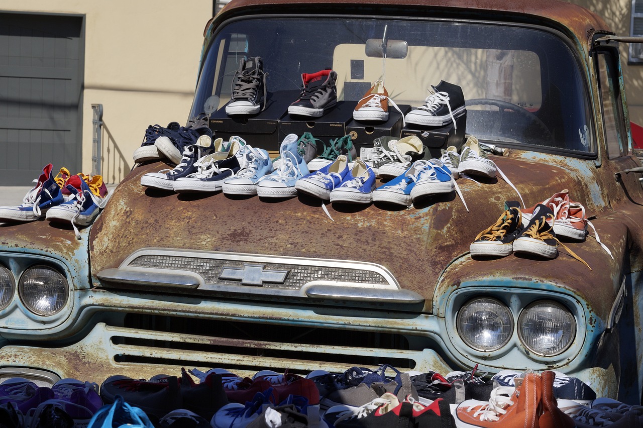 shoe sale, sidewalk sale, rusty truck